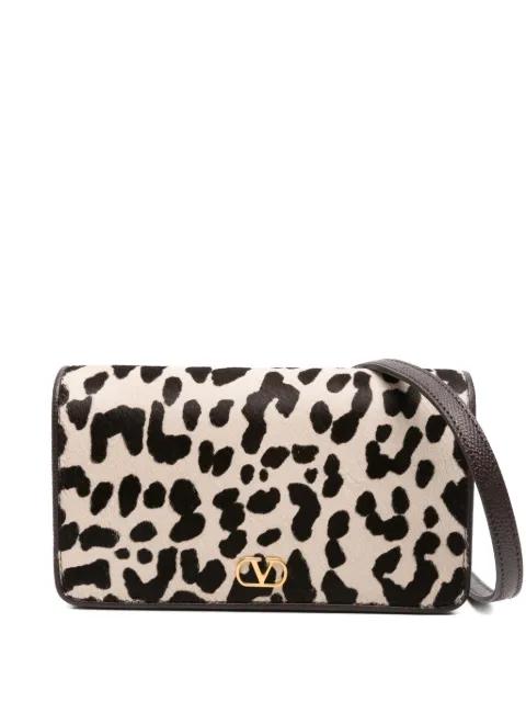 mini leather clutch by VALENTINO