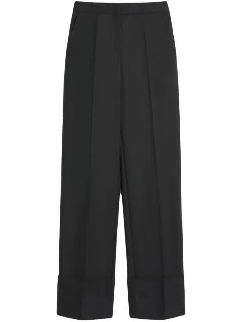pleated trousers by VALENTINO