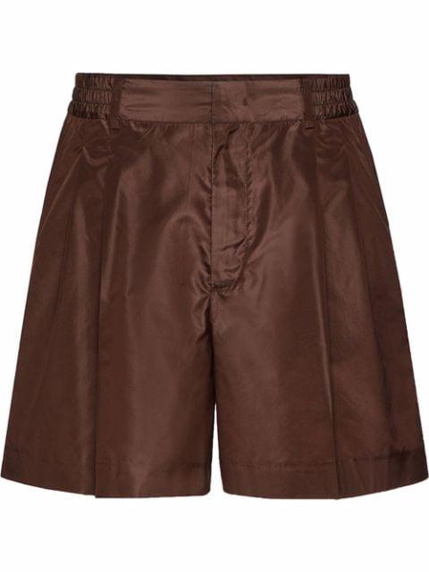pressed-crease tailored shorts by VALENTINO