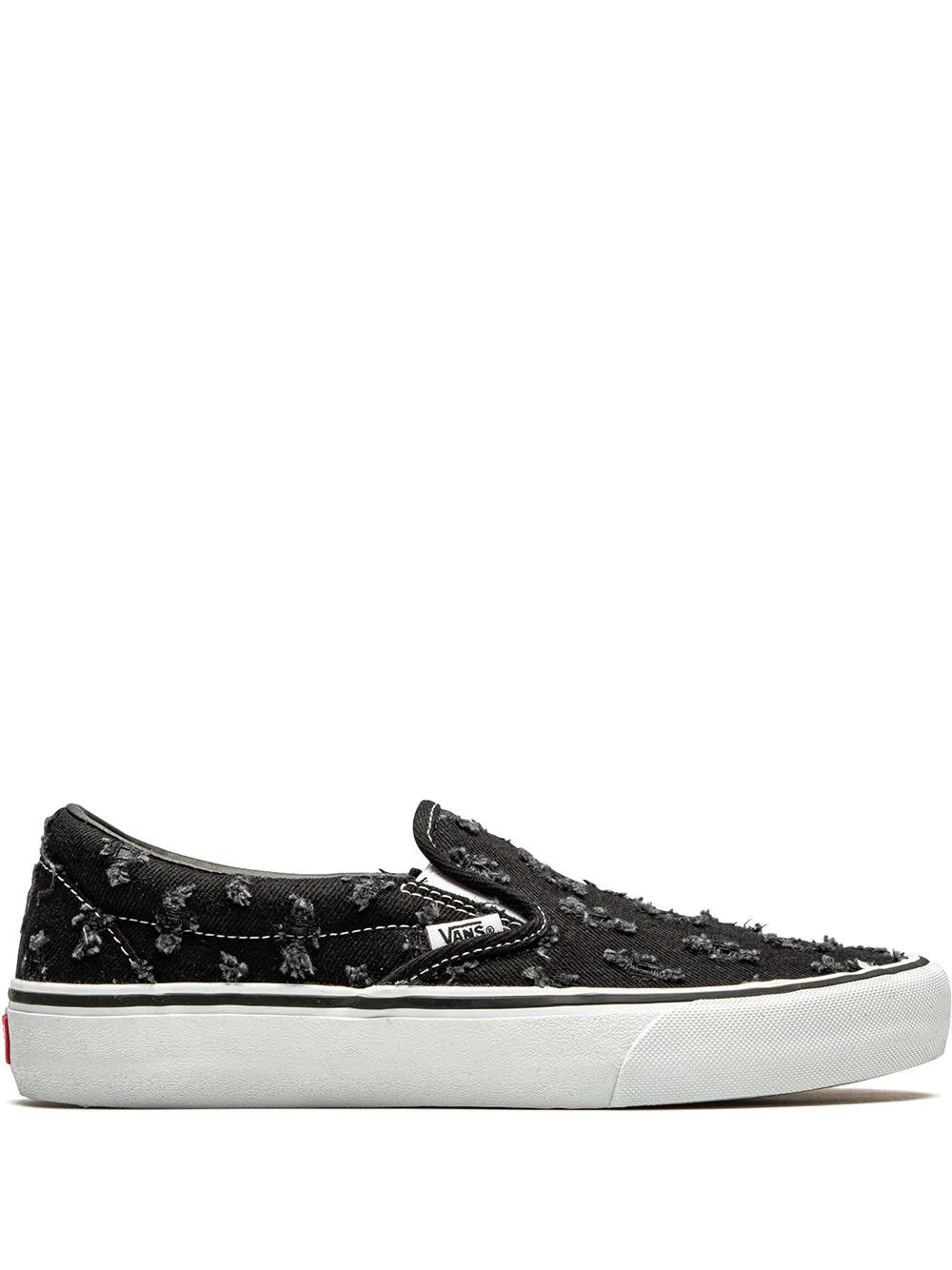 x Supreme Slip-On Pro "Black Hole Punch Denim" sneakers by VANS