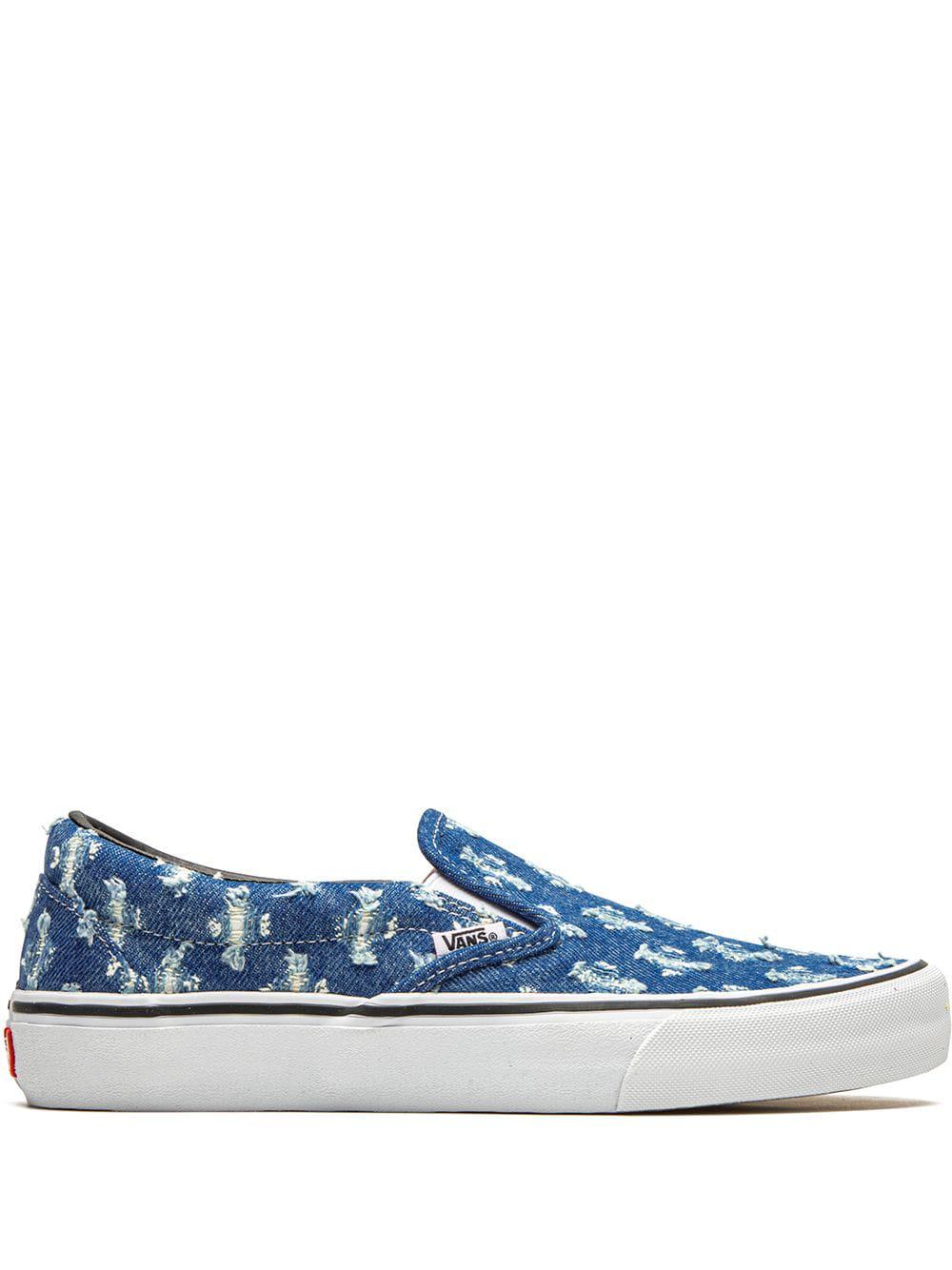 x Supreme Slip-On Pro "Blue Hole Punch Denim" sneakers by VANS
