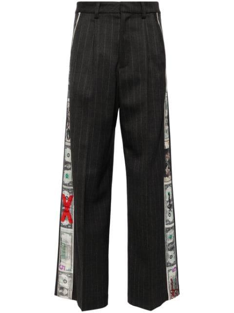 dollar-print trousers by VAQUERA