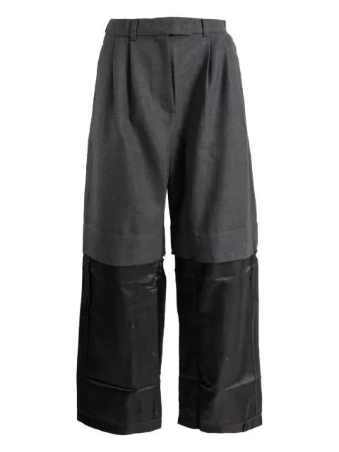 pleated-front panelled trousers by VAQUERA