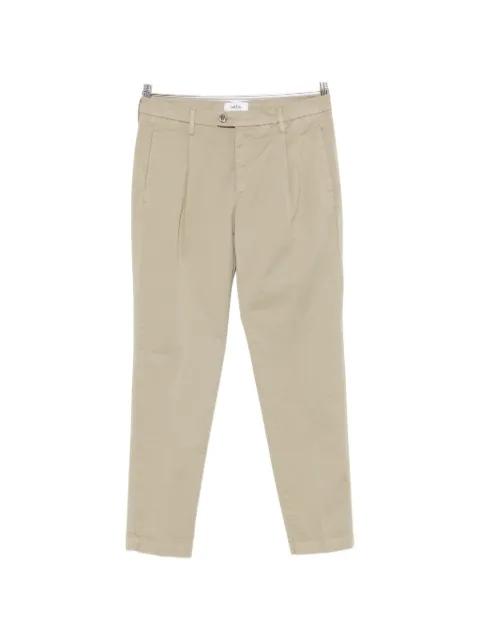 belt-loop pleated trousers by VELA SHOP
