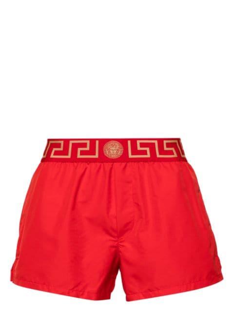 Greca Border swim shorts by VERSACE
