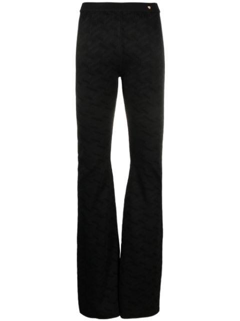 Greca-knit flared trousers by VERSACE