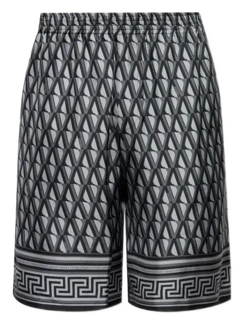 Greca-trim silk shorts by VERSACE