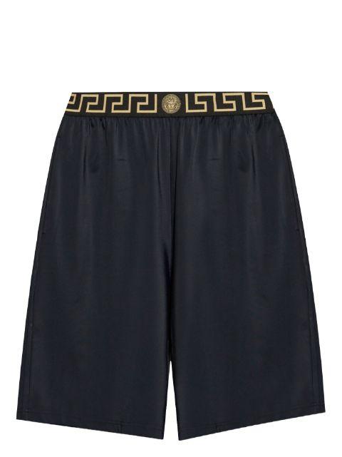 Greca-waistband shorts by VERSACE