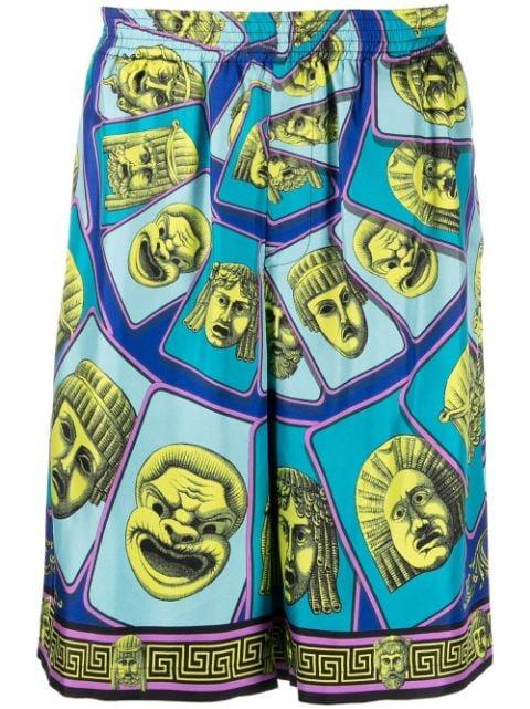 Le Maschere print silk shorts by VERSACE