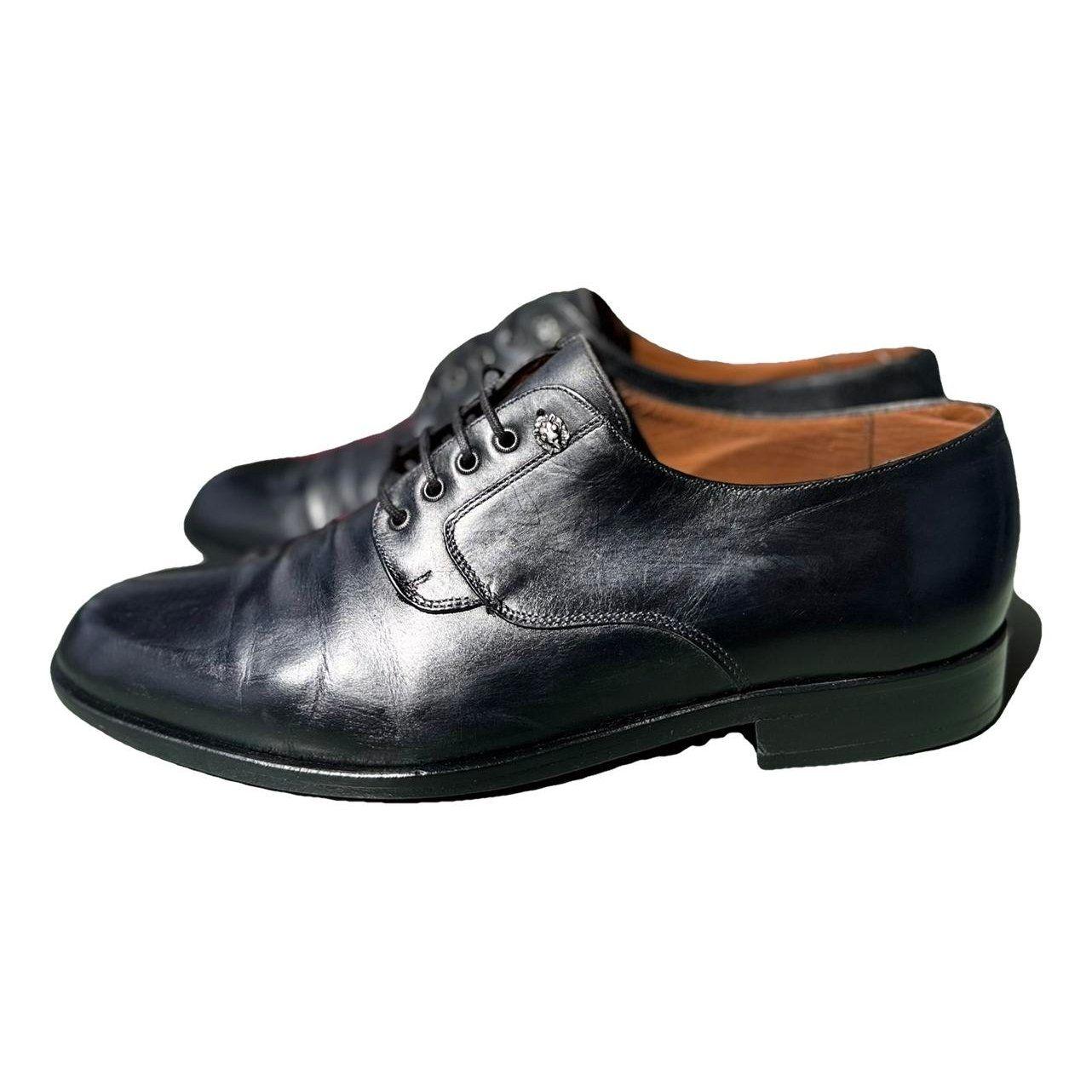 Leather lace ups by VERSACE