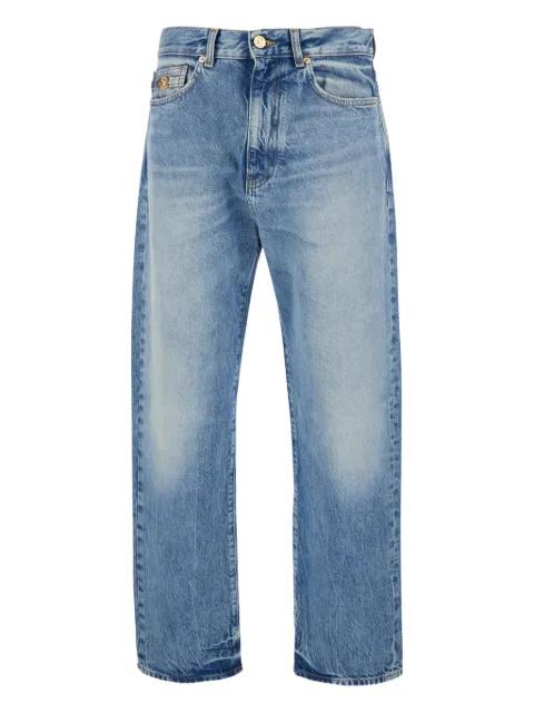 Medusa buckle cotton wide-leg jeans by VERSACE