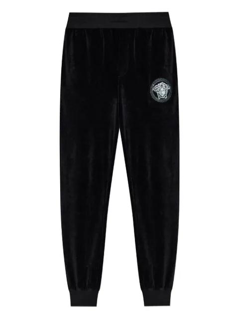 Medusa-embroidered track pants by VERSACE