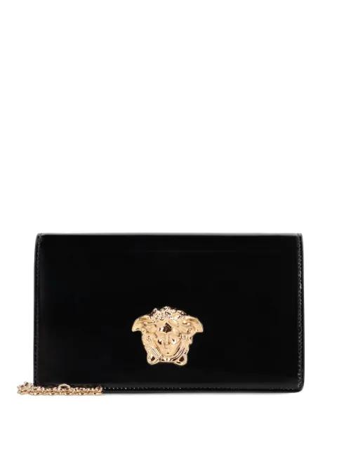 Medusa patent-leather clutch bag by VERSACE