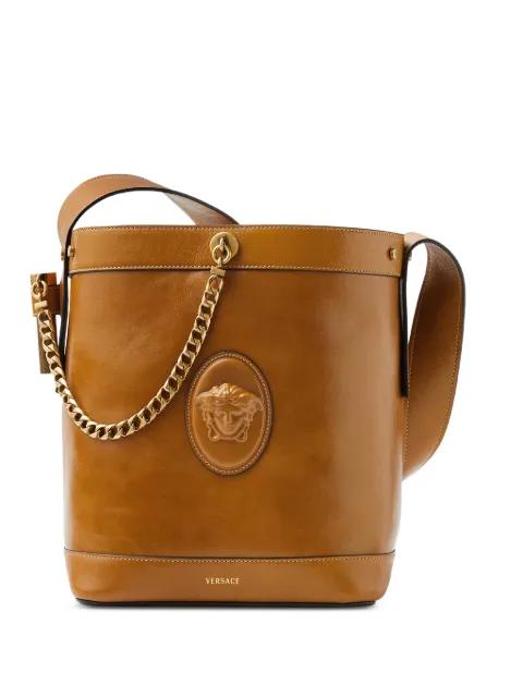 Pivot small leather bucket bag by VERSACE