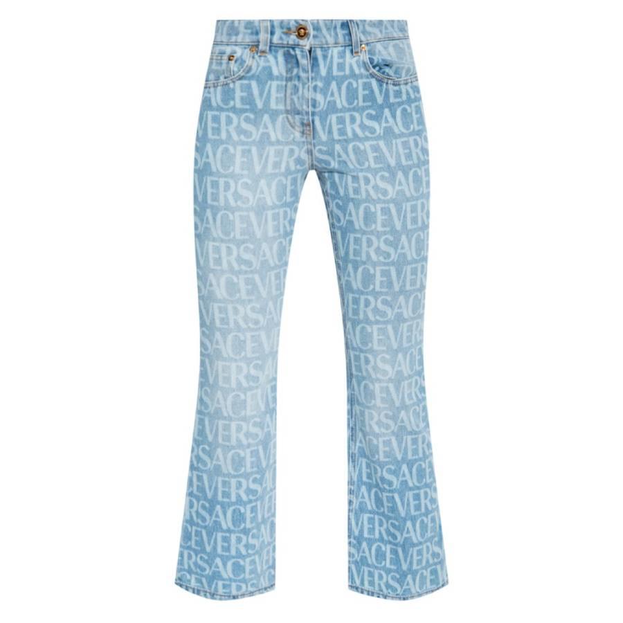 Versace All Over Monogram Flare Denim Jeans by VERSACE