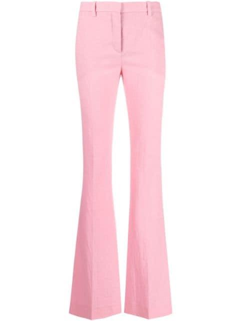 Versace Allover jacquard trousers by VERSACE