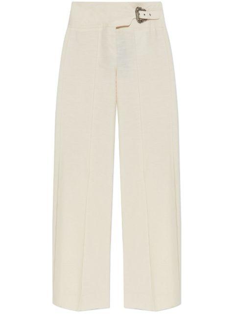 baroque buckle trousers by VERSACE