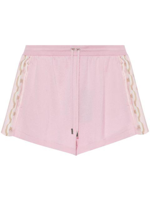 chain-link detail shorts by VERSACE