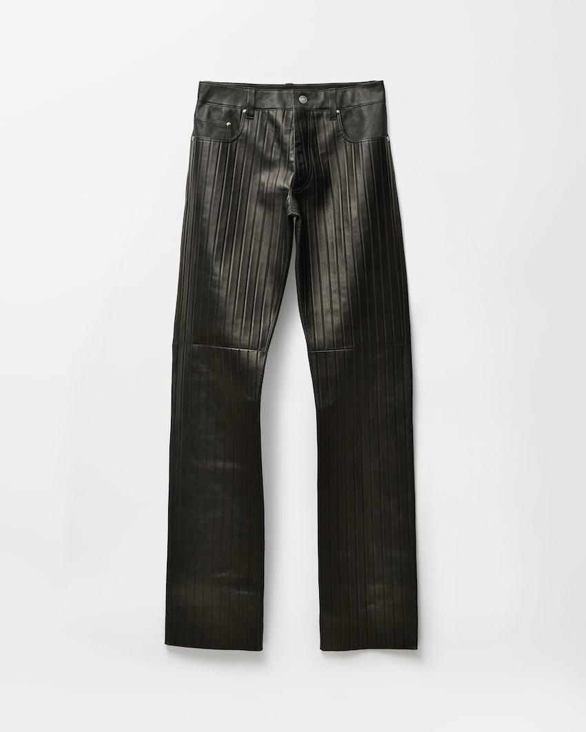 embossed leather pants by VERSACE