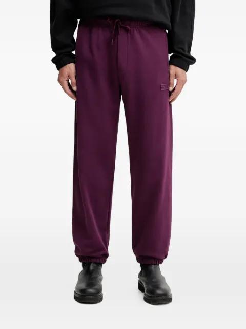 logo-detailed track pants by VERSACE