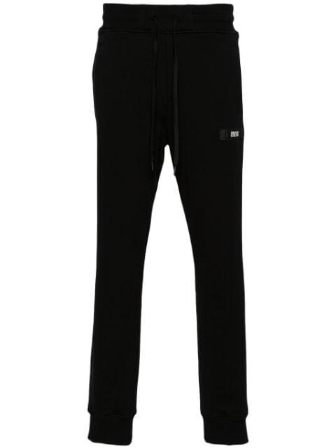 logo-patch cotton track pants by VERSACE