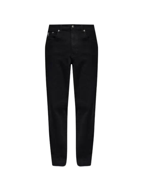 logo patch denim jeans by VERSACE