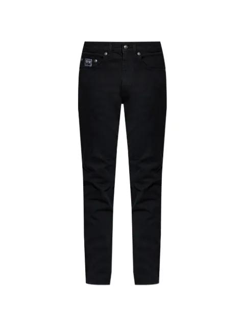 logo patch jeans by VERSACE