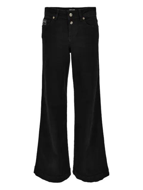 logo-plaque jeans by VERSACE