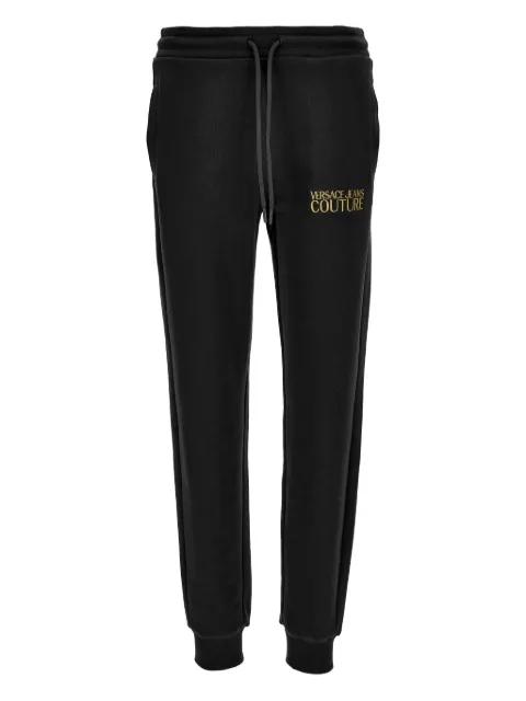 logo-print track pants by VERSACE