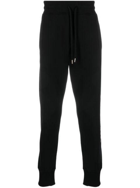 logo-print track trousers by VERSACE