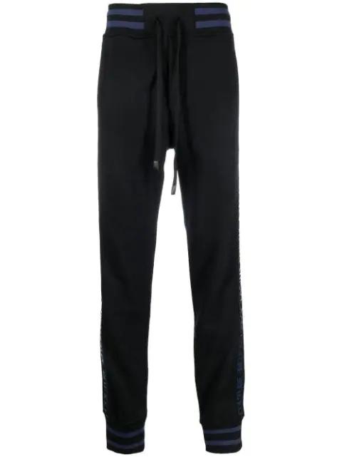 logo-stripe track pants by VERSACE