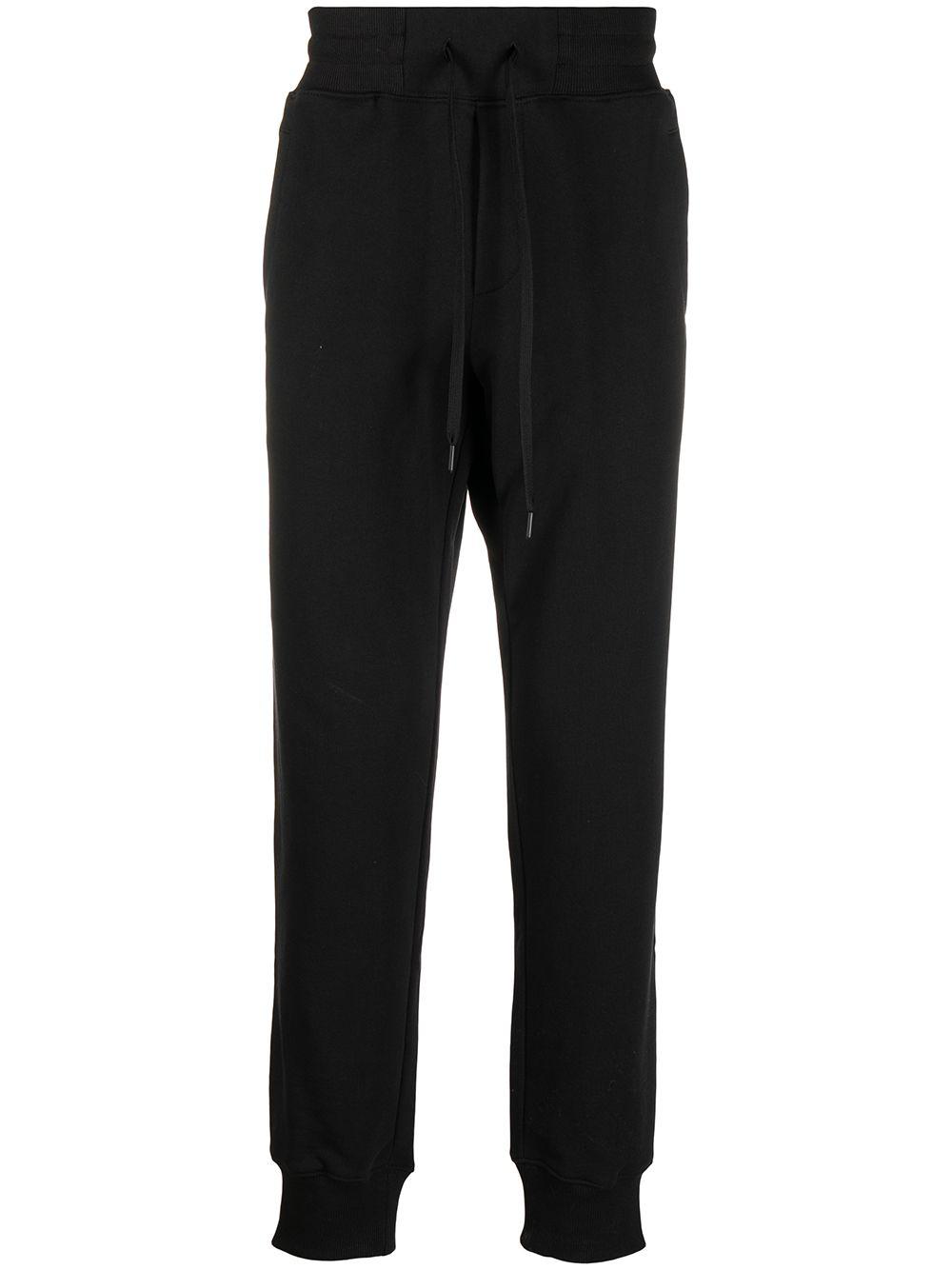 logo-tape track pants by VERSACE
