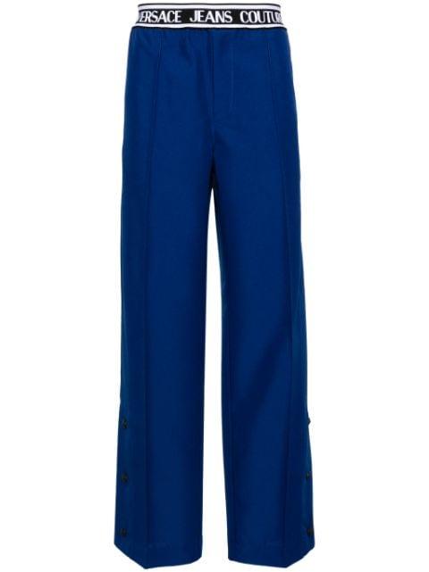 logo-waistband wide-leg trousers by VERSACE