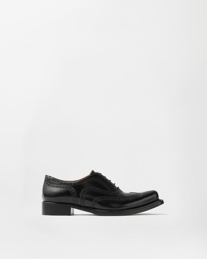 maverick leather derby shoes by VERSACE