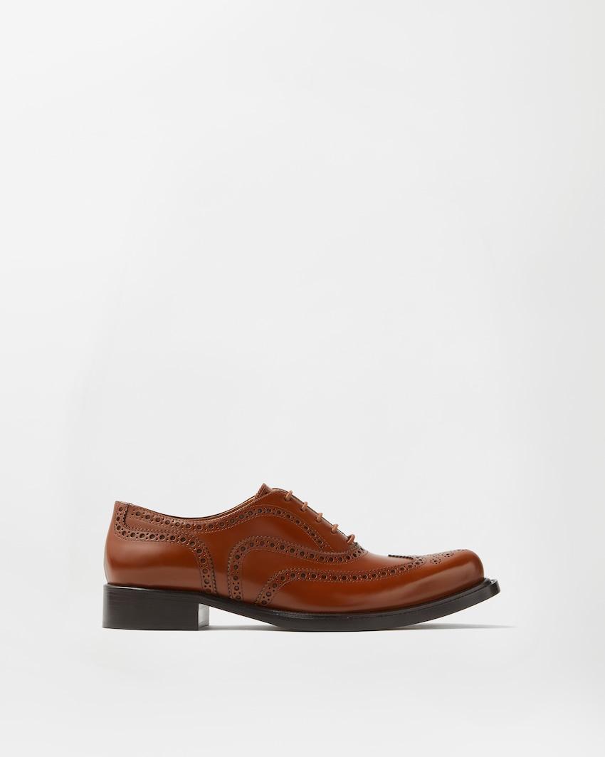 maverick leather derby shoes by VERSACE