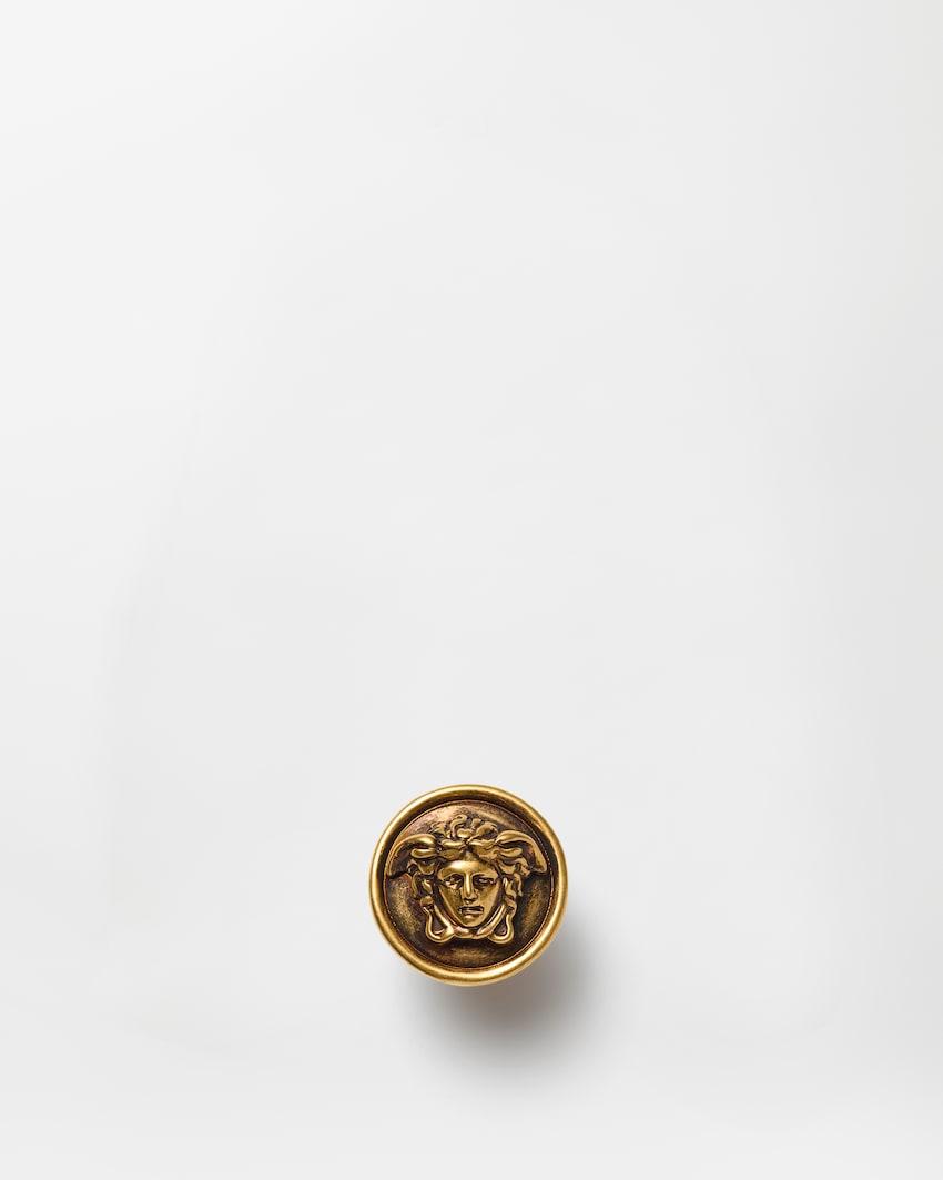 medusa brooch by VERSACE