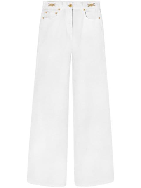 mid-rise flared jeans by VERSACE