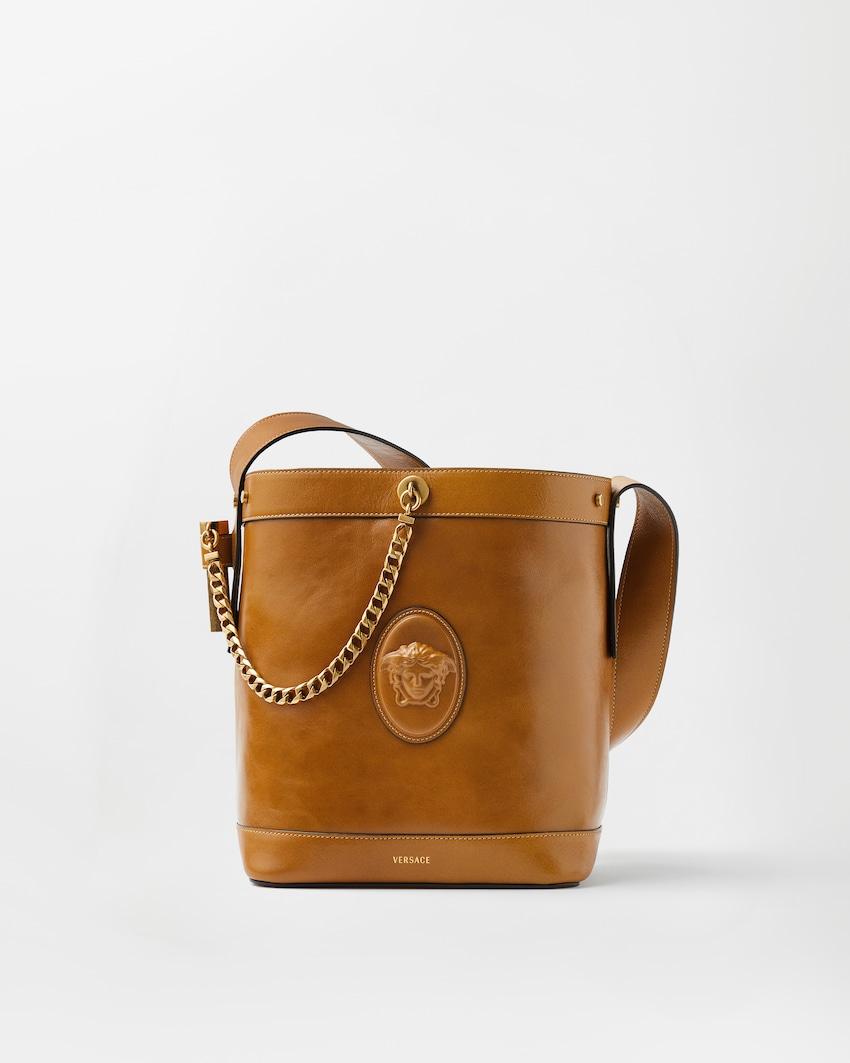 pivot small leather bucket bag by VERSACE