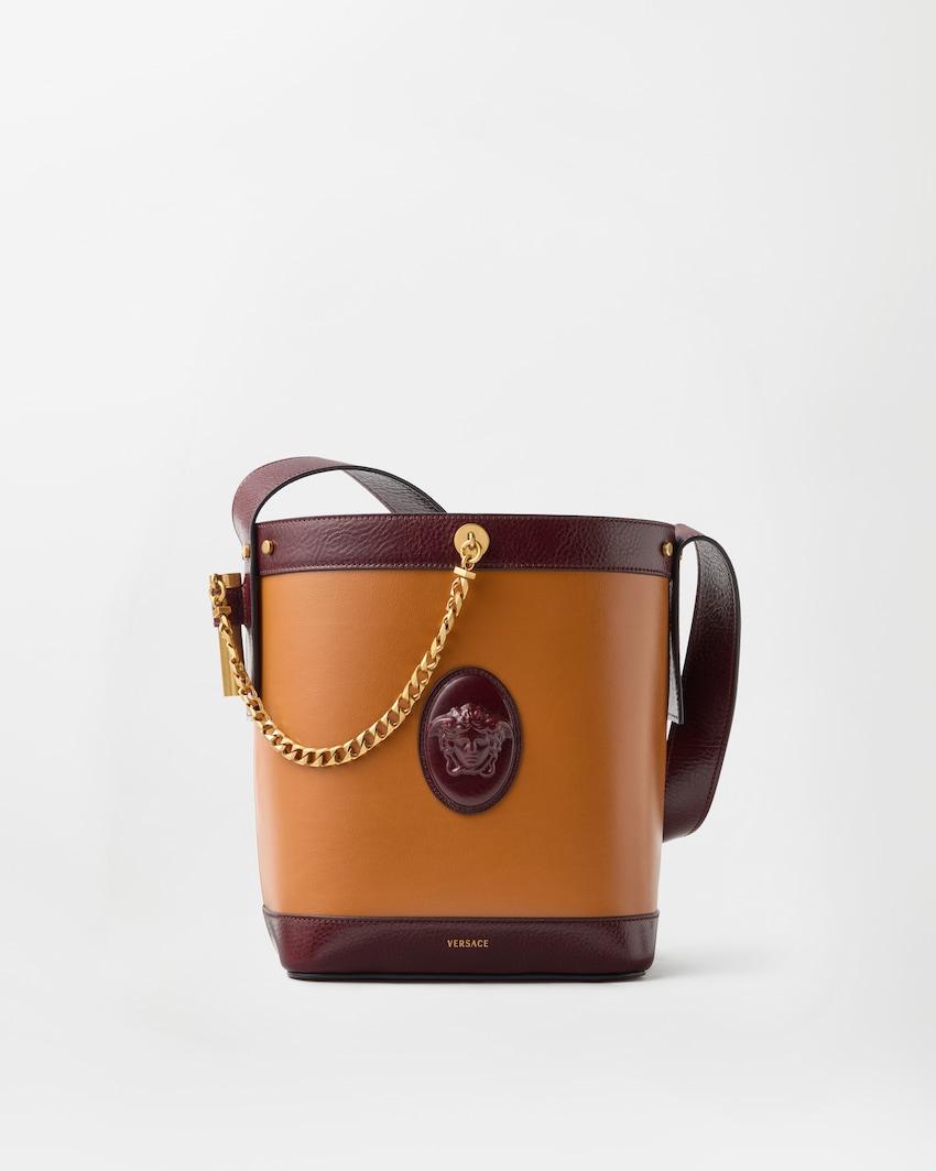 pivot small leather bucket bag by VERSACE