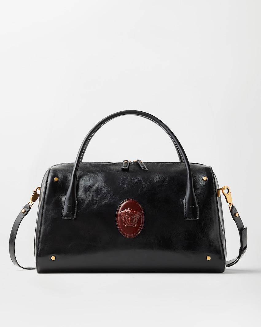 roomy large leather duffel bag by VERSACE