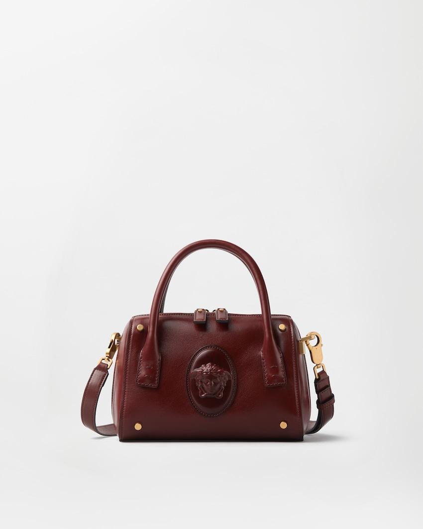 roomy small leather boston bag by VERSACE