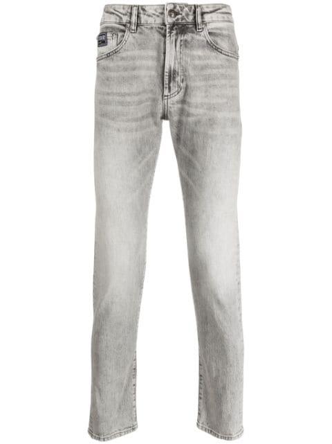 whiskering-effect straight-leg jeans by VERSACE