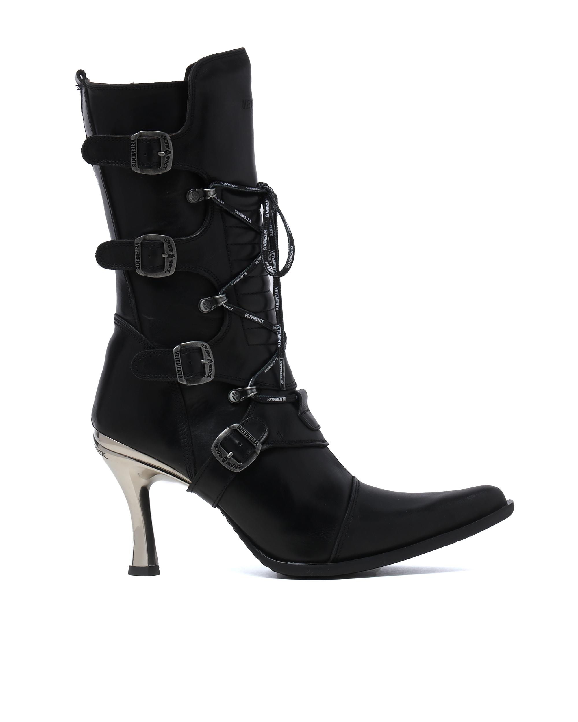 Buckle detail boots by VETEMENTS