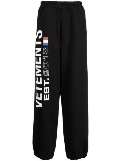 Flag-logo print track pants by VETEMENTS