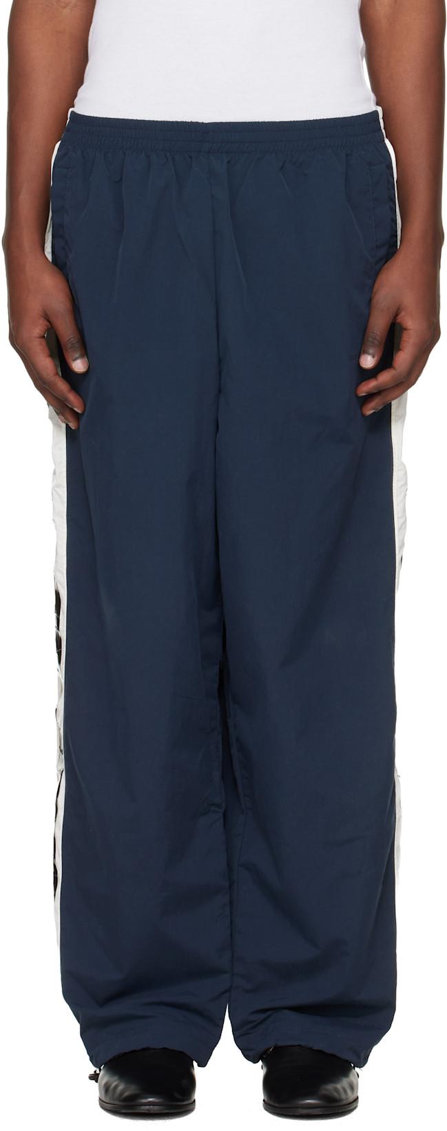 Navy Taped Track Pants by VETEMENTS