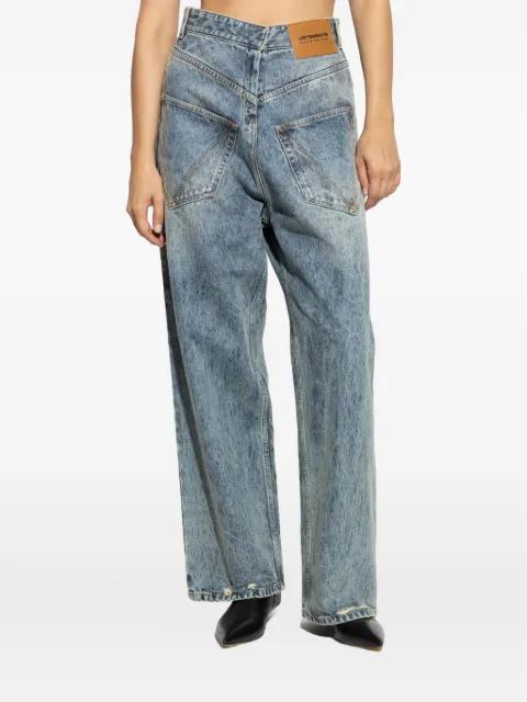 distressed-effect wide-leg jeans by VETEMENTS