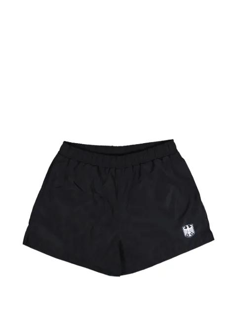 eagle-detail swimshorts by VETEMENTS