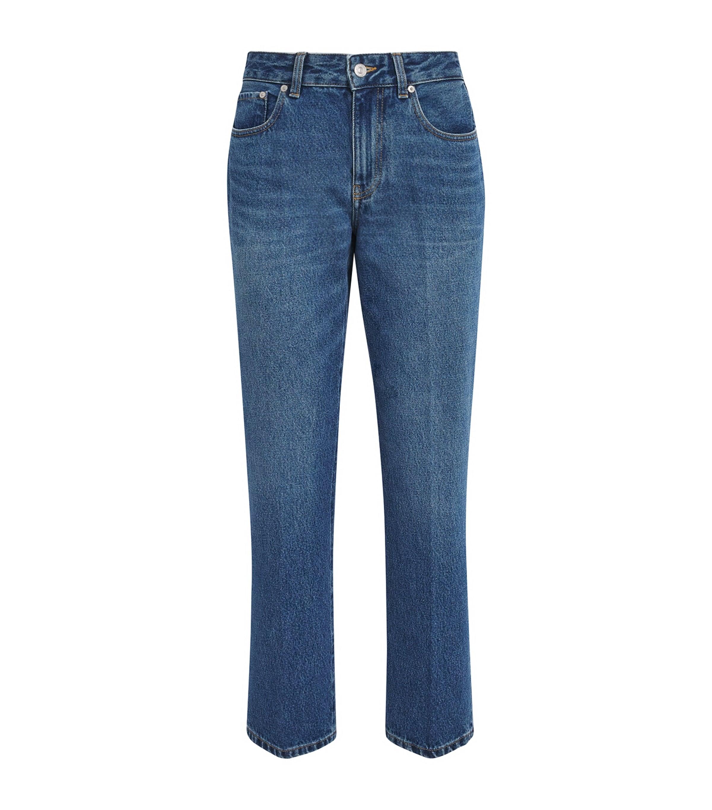 Victoria Beckham Low-Rise Flared Jeans by VICTORIA BECKHAM