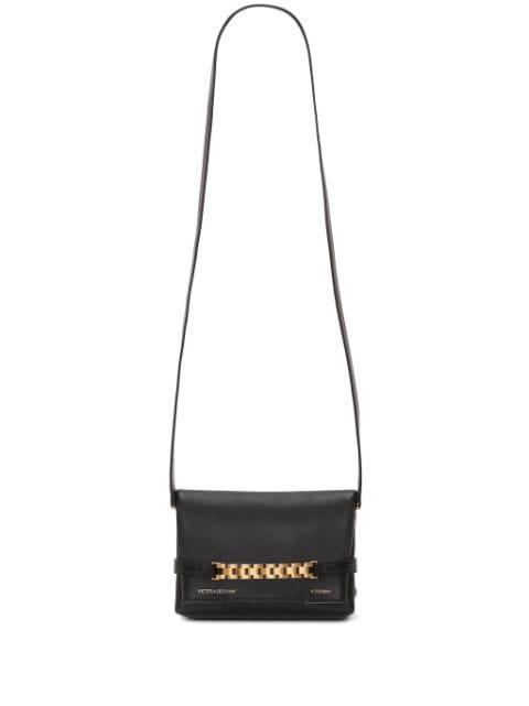 logo-print leather clutch bag by VICTORIA BECKHAM