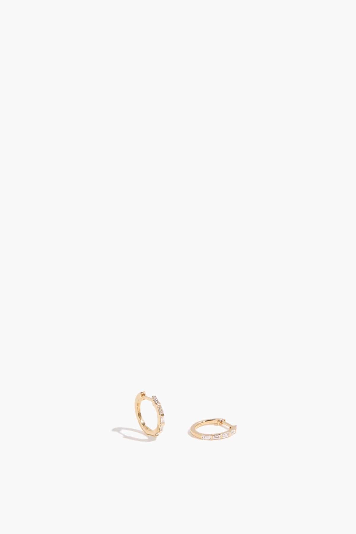 Baguette Huggies in 14k Yellow Gold by VINTAGE LA ROSE